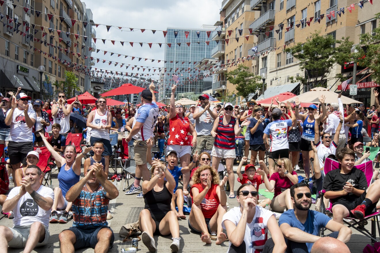 Fans at The Banks' Women's World Cup viewing party react to Cincinnati native Rose Lavelle's goal during Sunday's game. The U.S. Women's Soccer team beat the Netherlands 2-0.